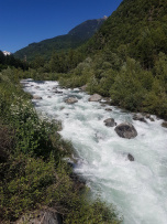 A long grade 4 rapid, starts with a weir on river right and a tongue on river left